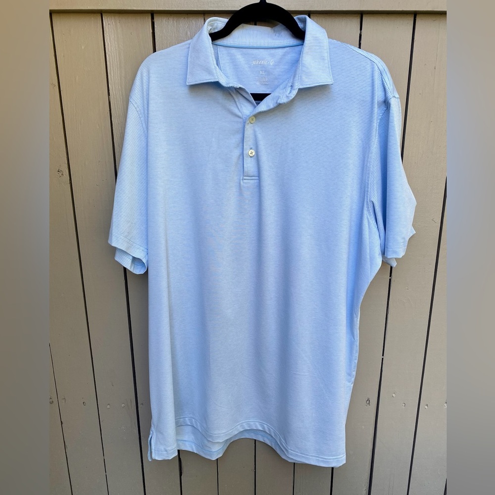 A light blue striped polo.